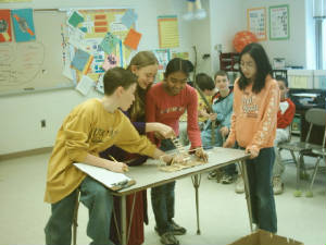 Sixth Graders testing their catapults.
